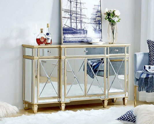 A luxurious mirrored sideboard with gold trim, featuring multiple doors and placed against a wall with a decorative painting above it.